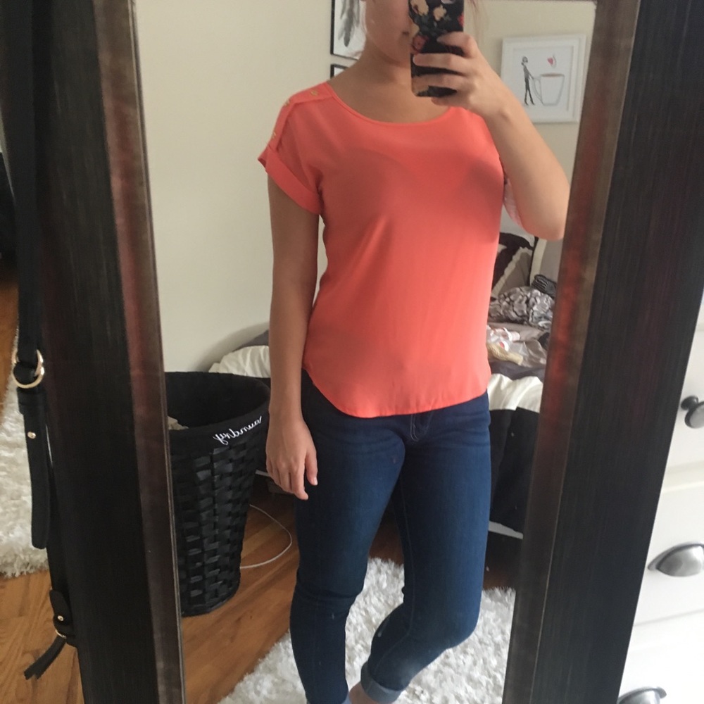 Orange colored blouse
